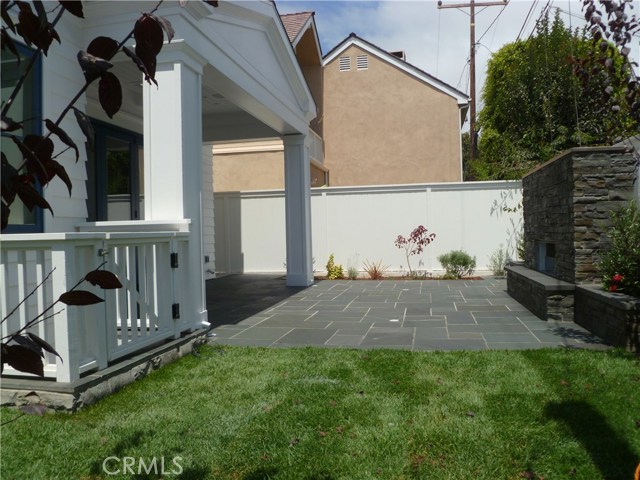 Private Grassy Backyard with Outdoor Fireplace