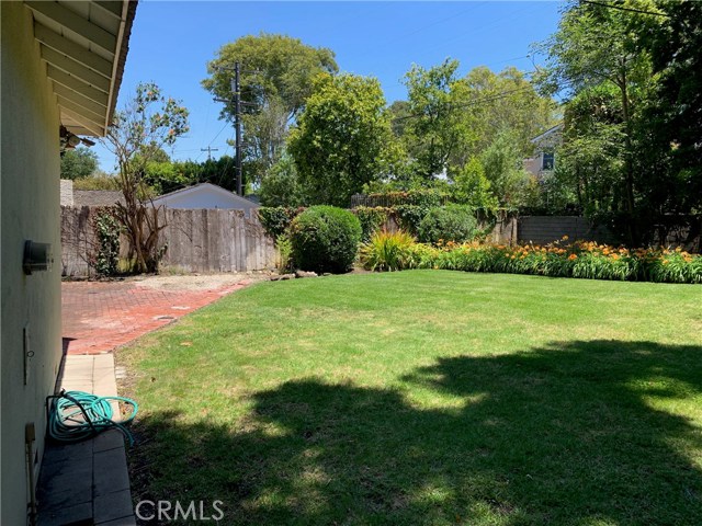 Backyard Area with Brick Patio