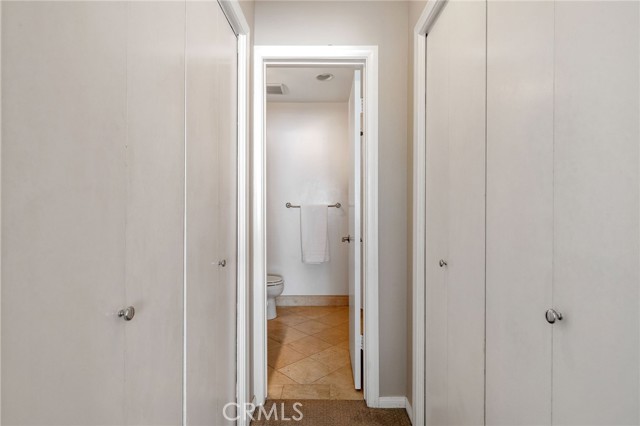 Closets on each side as you enter into the bath.