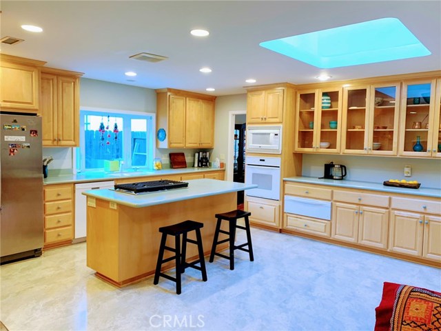 Bright kitchen with breakfast area.