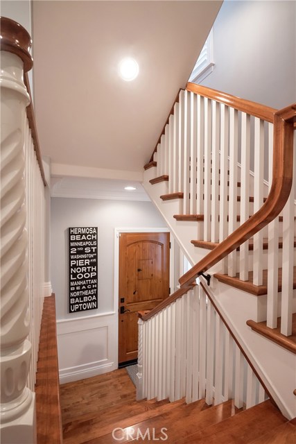 Entry way with hardwood floors throughout