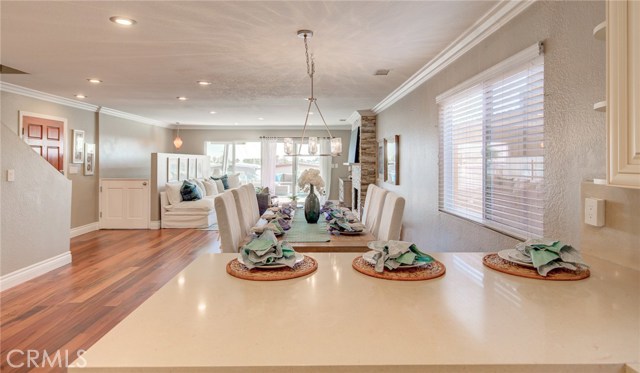 Bright and airy first level offers an open concept floor plan that flows organically throughout entire home opening up to a massive 400 SF outdoor space.