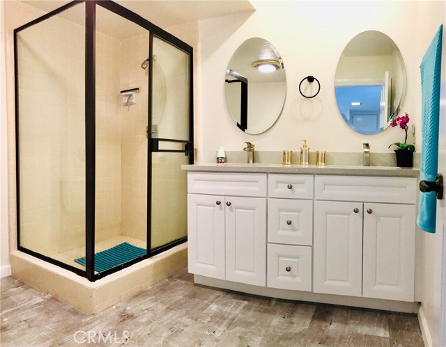 upgraded bathroom with new vanity and countertop