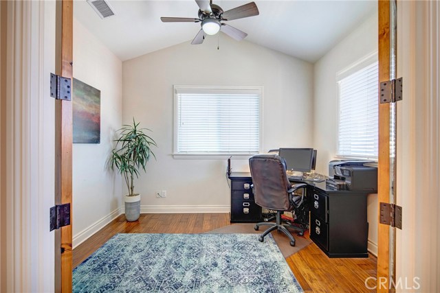 Den/office with French doors that is adjacent to the living room and could easily be converted to a 4th bedroom.