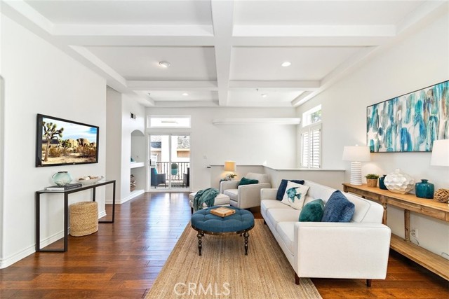 Great family room with gorgeous ceilings and wood floors