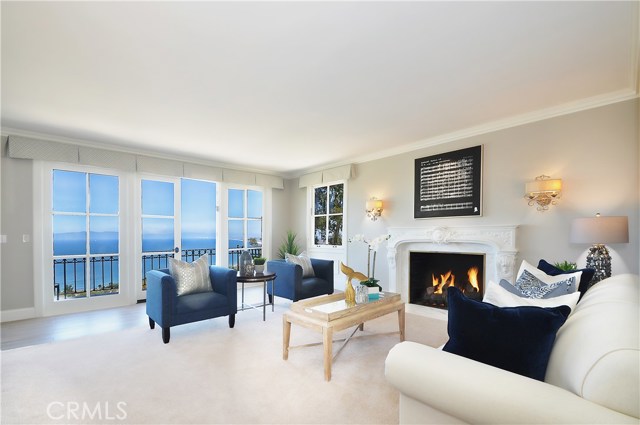 Formal Living Room with lovely fireplace.