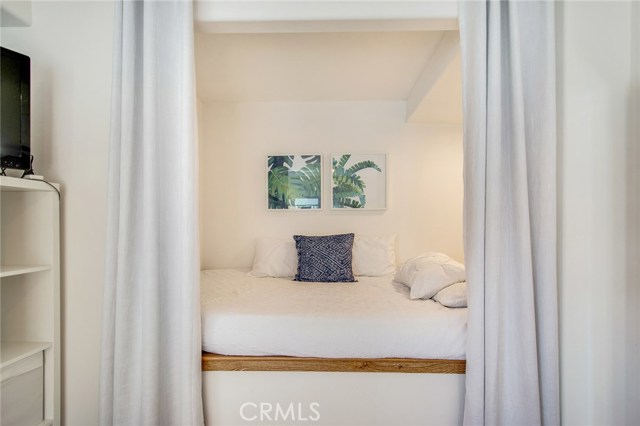 Lower level studio bed area nook.