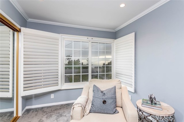 Master bath sitting area with ocean view