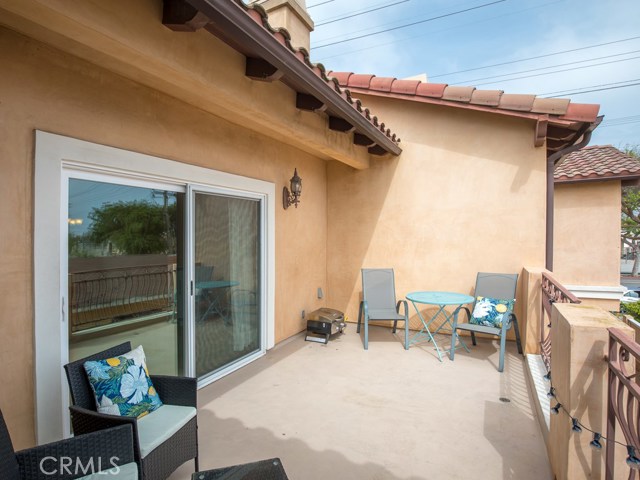 Sunny large balcony accessible from living room and master bedroom