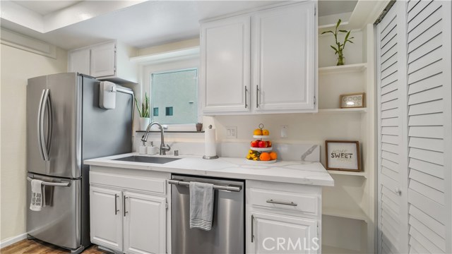 Clean bright kitchen with Stainless Appliances and sink