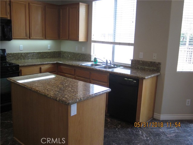 Spacious kitchen with island, lots of storage.