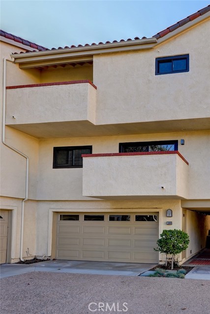 A two car garage with a washer and dryer included.
