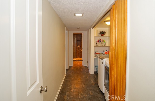 Downstairs Hallway to 4th Bedroom, Laundry and Bathroom