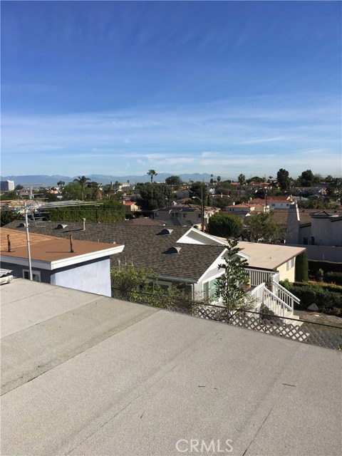 This view photo was taken from the roof of the rear rec room. Buyer's elevations may be different.