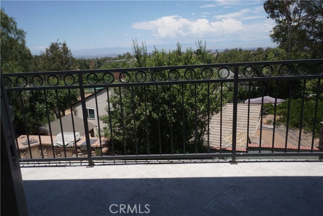 Upstairs bedroom balcony and city lights view