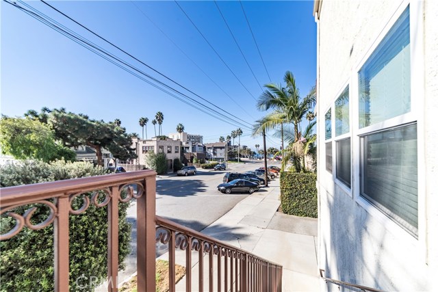 Locked Gate off courtyard leads to a staircase. The Redondo Beach Pier and dining is just around the corner and less than two blocks away.