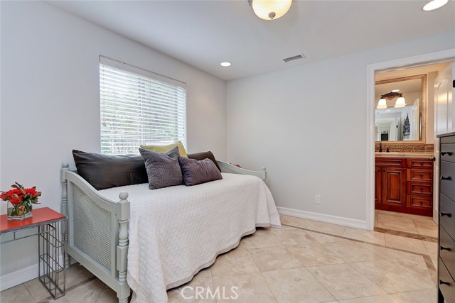 Fourth Bedroom on the first floor with it's own den and bath.