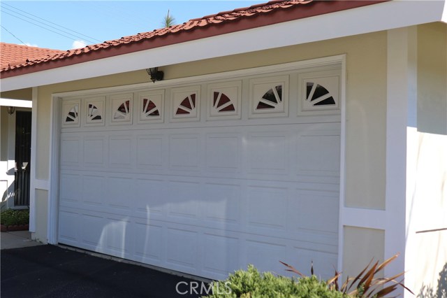 New Garage Door with Remote Control.  Window in garage.