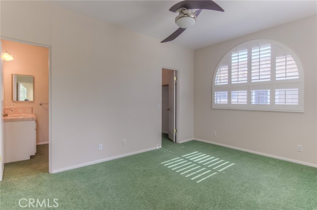 Upstairs bedroom with walk in closet and bathroom