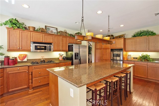 Real Hardwood Flooring, craftsman style cabinetry and granite countertops.