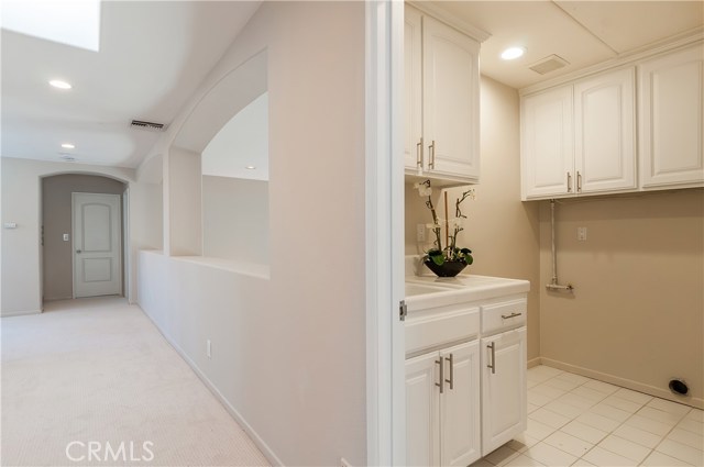 Laundry room off central hallway on second level.  Hall is 6' wide--very open