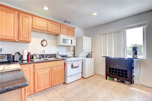 Unit C kitchen stove, microwave, refrigerator, washer and dryer are all included.