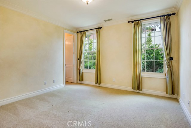 All bedrooms have in suite baths. This is bedroom #2 near Master, with a large walk in closet.