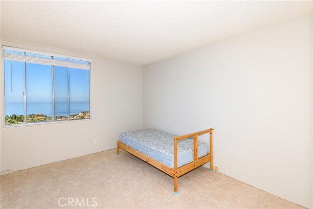 Guest bedroom, too, with ocean view.