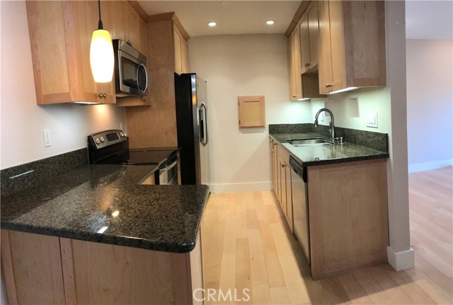 Kitchen with Custom Maple Cabinets and Granite Counters