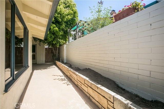 The patio runs the length of the rear of the home