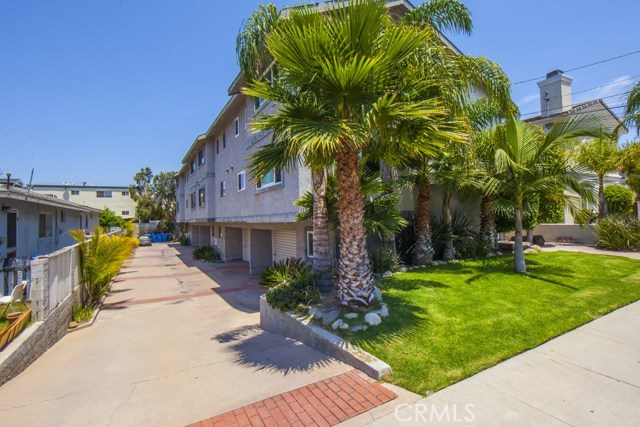 Driveway leads to attached two car garage