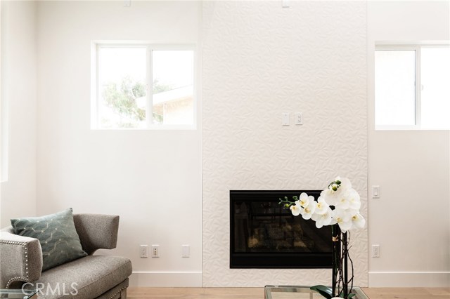 Gorgeous floor to ceiling tile fireplace