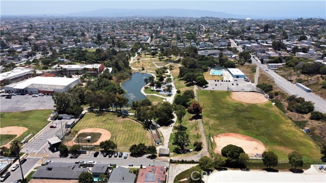 Looking South from above the property. Pollywog Park, MB Middle School and playground, MB Premier LL, Begg Pool, etc.