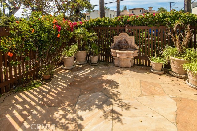 Private stone patio with water feature, drip watering system for the pants plus malibu lighting! Private stone patio with water feature, drip watering system for the pants plus malibu lighting!