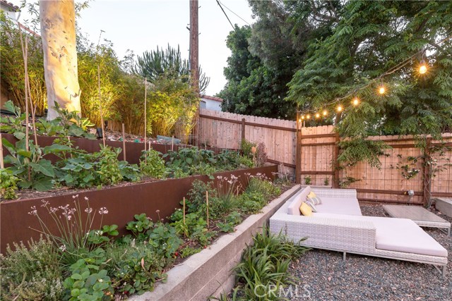 This is a garden your friends will envy.  Too many different fruits and vegetables and herbs to mention in this fantastic organic garden.