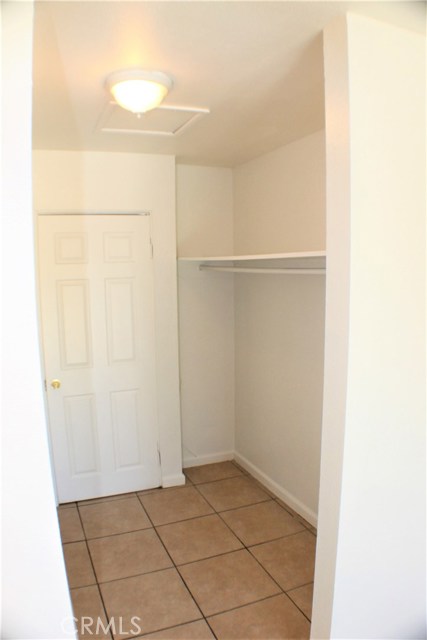 Master Bedroom Walk-Thru Closet