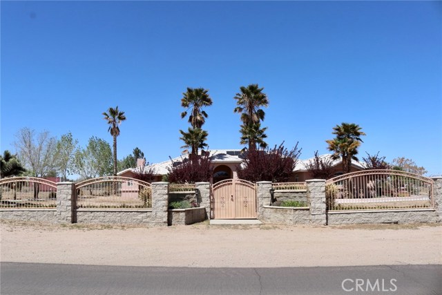 Front of the property.  Vehicle gate access on the right hand side.