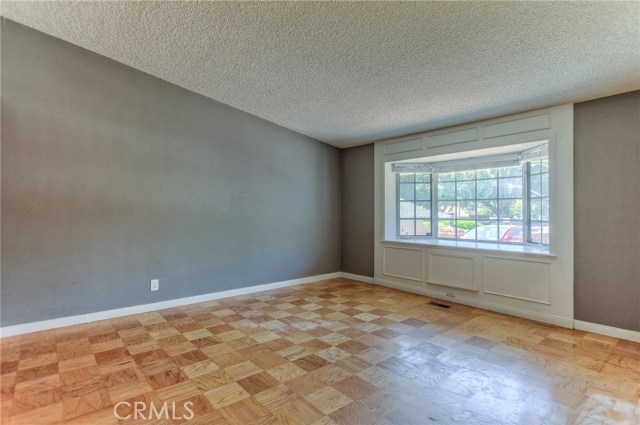 Master bedroom with large bay windows