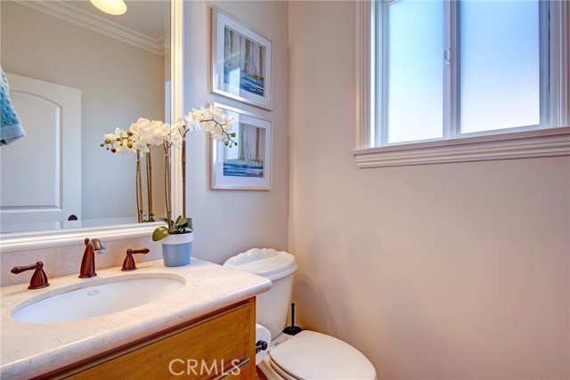 Upstairs powder room for guests.