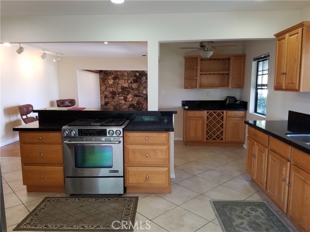 Beautiful Island with Jenn-Air Gas,Oven,Stove,Grill & Built in Wine Storage & Countertops all in Matching Granite