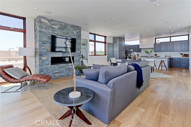 Living room with natural stone fireplace