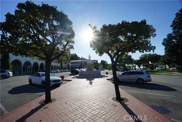 Historic Malaga Cove Plaza with ocean in the distance.