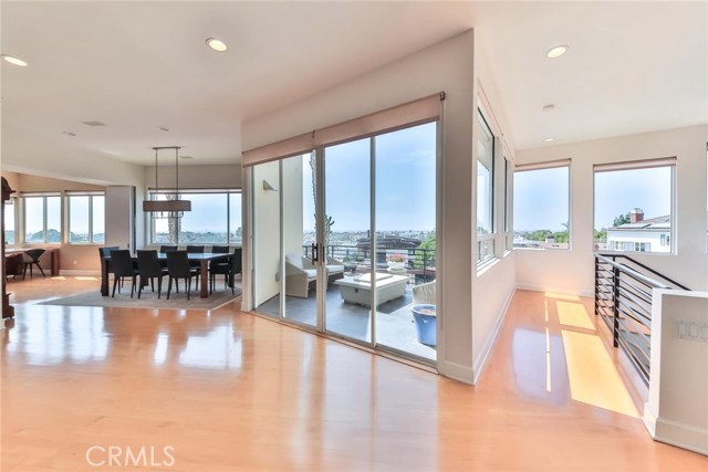 top floor with dining and living room with panoramic views