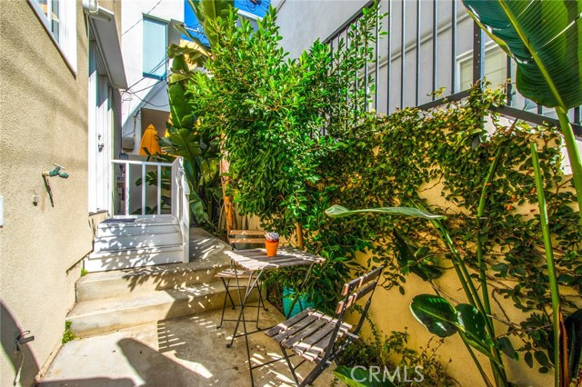 Lower level back patio - charming space off the rentable studio.