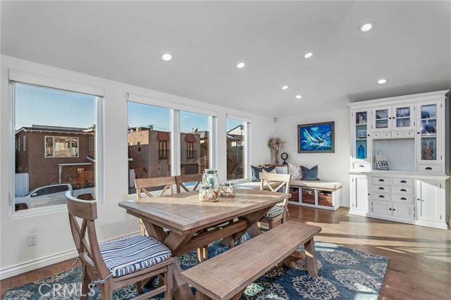 Vaulted ceilings and designer touches highlight the open kitchen area.