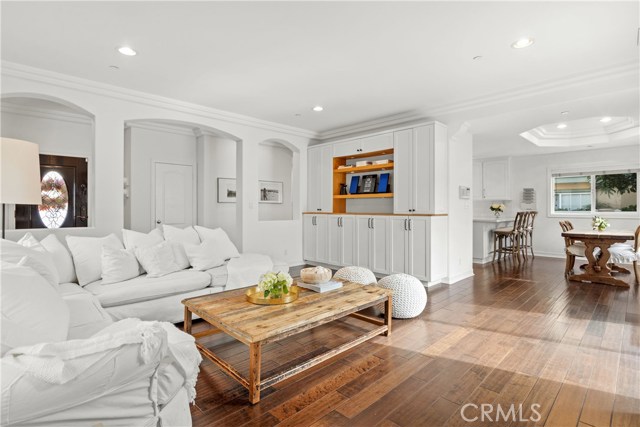 Living room opens up to dining area and kitchen.