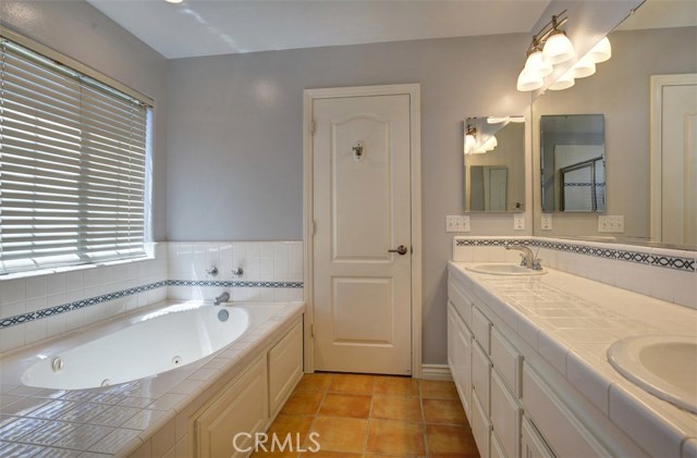 View from master bath toward master bedroom, not full with mirror over twin sink vanity