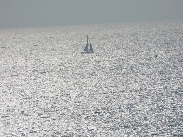 Ocean views with sail boat taken from 3rd floor living area.