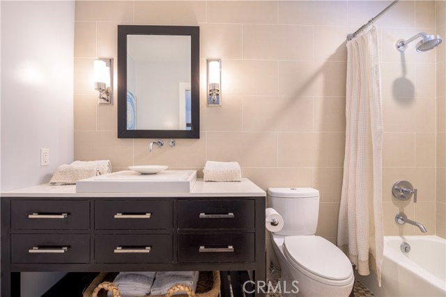 Bathroom adjacent to upstairs bedroom