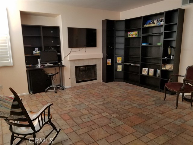 Family Room Includes Handsome Gas Fireplace And Built In Shelves For AV Equipment, Books Or Your Favorite Memorabilia.